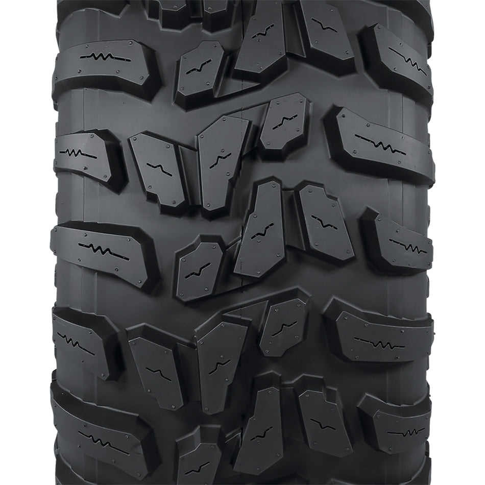 Close up view of the tread pattern and lug design with connecting centerline base block for extended wear and control, featuring block siping for added wet traction, and a high traction all terrain design, great for worksites, hard surfaces, and gravel.