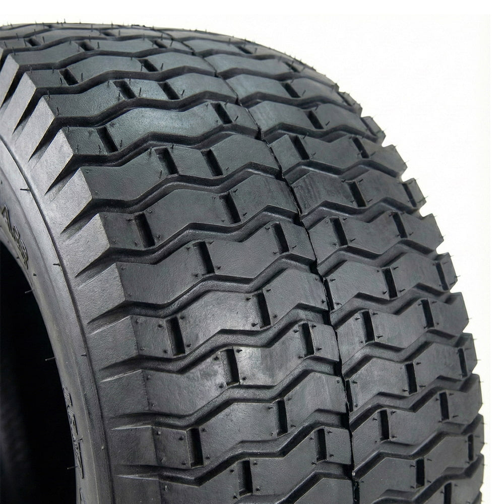 Close-up, detailed view of the tread pattern and interlocking chevron lug block design featured on the popular and capable Carlisle Turf Saver yard and mower tire.