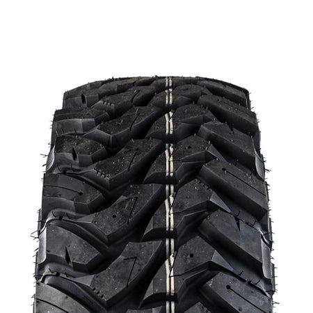Close up detailed view of the tread on the DragonFire Yuha RT all-terrain SBR tire designed for high performance UTV and SXS, featuring tapered tread blocks, strategic siping and block notching, along with serrated tread edges, all designed for premium traction in all conditions.