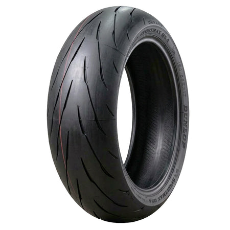 Angled view of the aggressive, new tread pattern optimized for sport riding, the Dunlop Sportmax Q5A motorcycle rear tire, designed to achieve more consistent performance as the tire wears and provide exceptional balance between dry and wet grip by utilizing a more prominent silica content, offered with fast and free shipping.