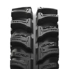 Detailed view of the overlapping center tread block design and widely spaced lugs of the EFX MotoSlayer 6-ply Bias mud tire, great for deep mud and swamps, offering premium cleanout capability and elite traction.