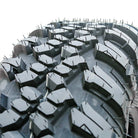 Close up detailed tread pattern view of the Forerunner Aurora A/T radial UTV tire.