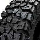 Close up detailed tread pattern view of the Forerunner X-Trekker UTV all-terrain tire featuring assymmetrical tread blocks an pocketed shoulder lug design.