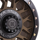 Close up and detailed view of the fit and finish quality on the all new Frontline 454 Beadlock 15" UTV and SXS wheels, featuring screw-on center cap with Frontline brand logo, and high quality stainless steel beadlock ring bolt hardware.