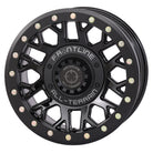 Angled view of the Gloss Black finish on the Frontline 454 15x7" UTV and SXS beadlock wheel, available in 4/137 and 4/156 dual bolt patterns as well as 5/4.5 bolt pattern, with 4+3 offset, sold with fast and free shipping by Ride or Die Tire.
