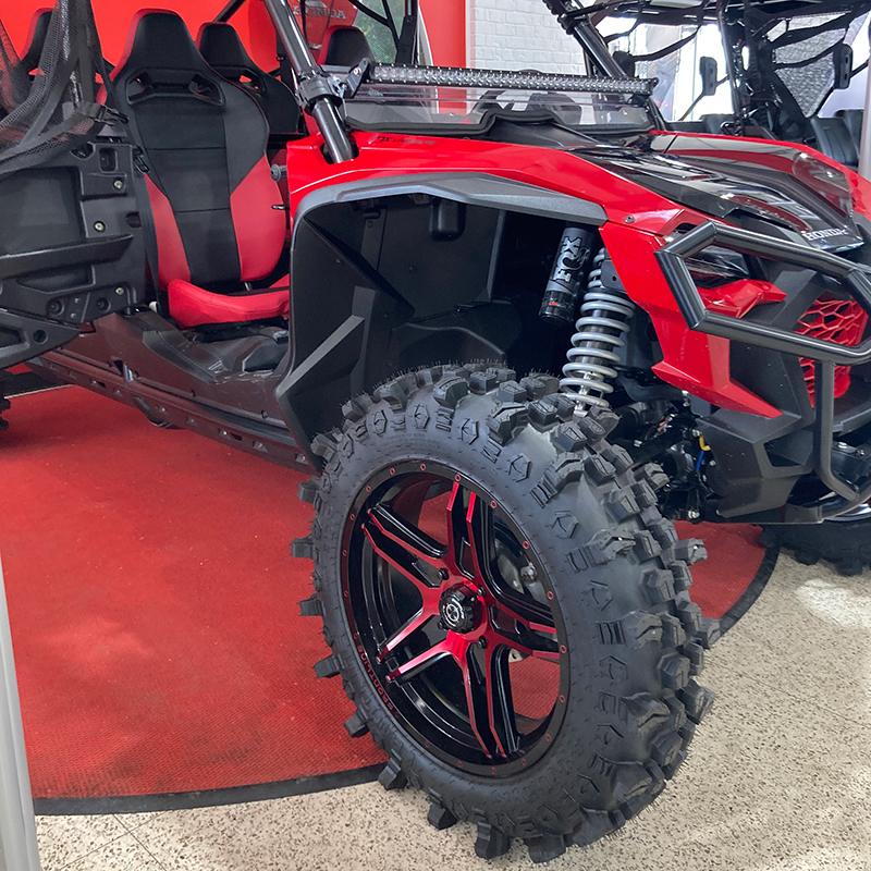 20" tall ACP tires mounted on 20" Frontline 505 wheels in dynamic red finish mounted on Honda Talon UTV.