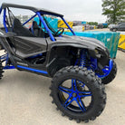 Dynamic blue 22" 505 Frontline UTV wheels mounted with ACP 22" tires on Honda Talon SXS.