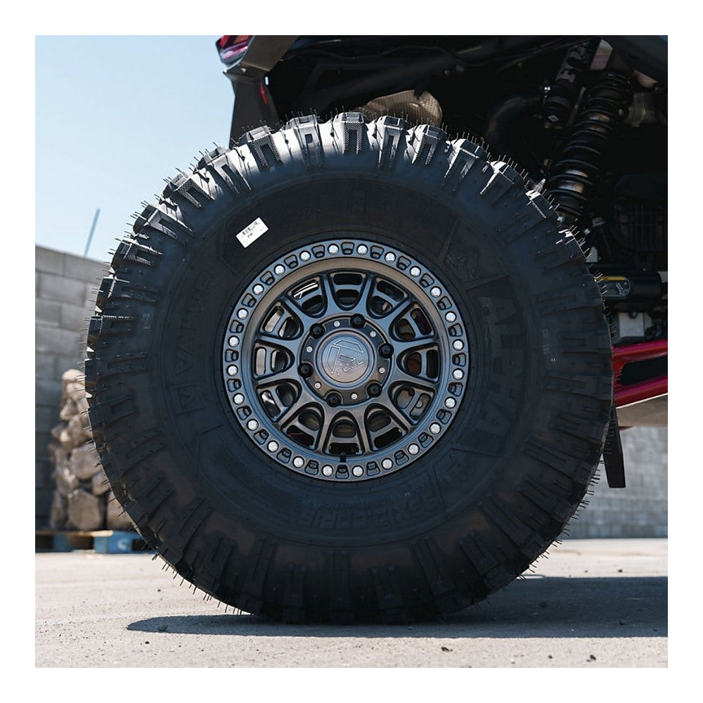 Fuel Cycle FV832 UTV wheel in gloss gunmetal, mounted on a UTV