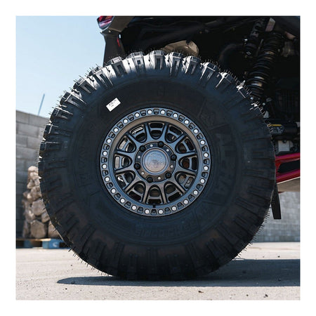 Fuel Cycle FV832 UTV wheel in gloss gunmetal, mounted on a UTV