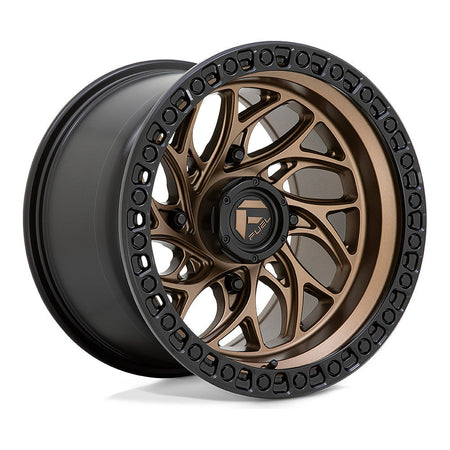 Fuel Runner D777 UTV wheel in bronze with black ring, angled front view