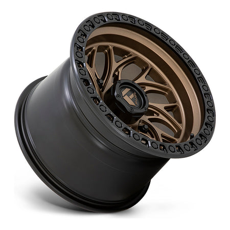Fuel Runner D777 UTV wheel in bronze with black ring, side angle showing the barrel and lip