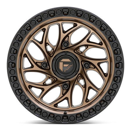 Fuel Runner D777 UTV wheel in bronze with black ring, straight-on face view