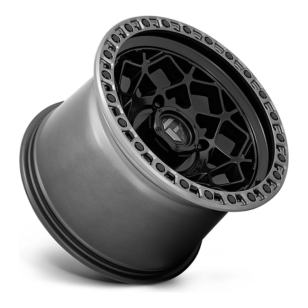 Fuel Unit D783 UTV wheel in matte black with gunmetal ring, side angle showing the barrel and lip