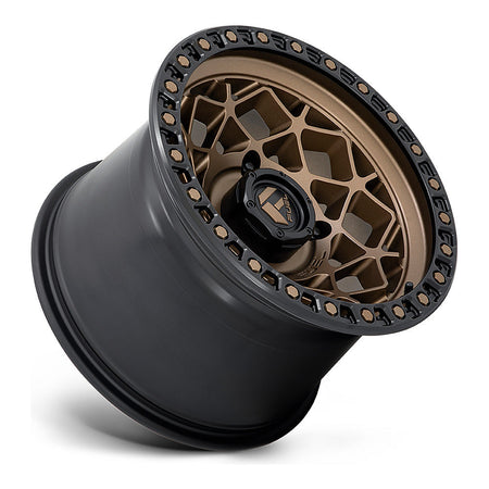 Fuel Unit D785 UTV wheel in bronze with matte black ring, side angle showing the barrel and lip