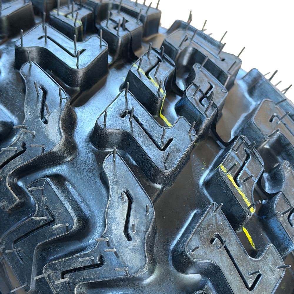 Close up detailed tread view of the unique lug design and pattern of the Galaxy Everest PSX farm, ranch, and multi-purpose UTV and RTV tire, designed with a long lasting and high traction rubber compound.