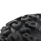 Close up view of the tread pattern and lug design featured on the all new T4 Roctane UTV and SXS tire by High Lifter STI, showcasing deep 3/4" to 1" deep lugs and staggered shoulder design to dig deep and hard in loose terrain.
