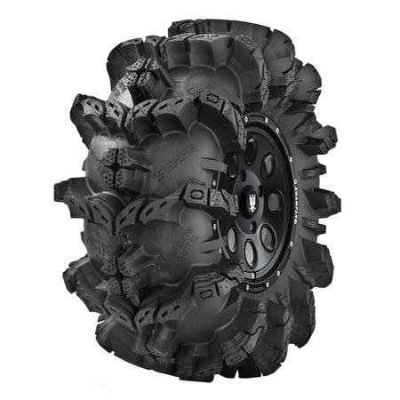 Angled view showing extra deep lugs on Interco Black Mamba ATV and SxS mud tire.