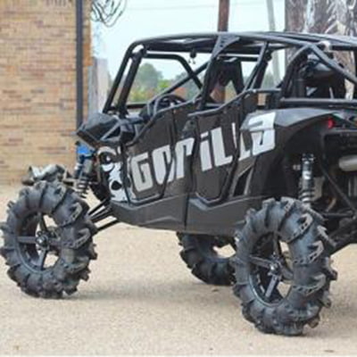 Gorilla Silverback tires installed on high performance Side by Side, parked in driveway.