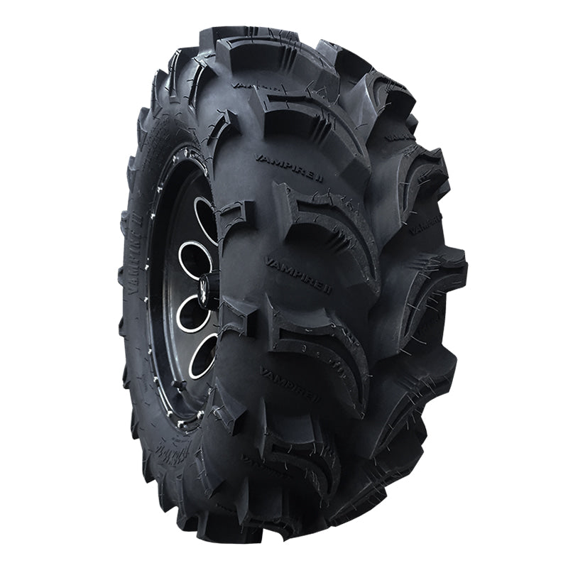 Angled view of Vampire II directional all-terrain ATV tire with aggressive tread.