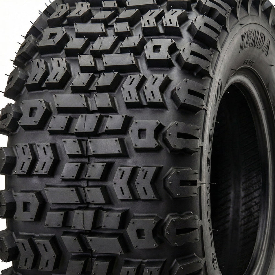 Close up view of the Kenda Terra Trac tread pattern and lug design, showcasing the tread pattern detail and lug arrangement specifically designed to promote traction for braking, accelerating, and side bite.