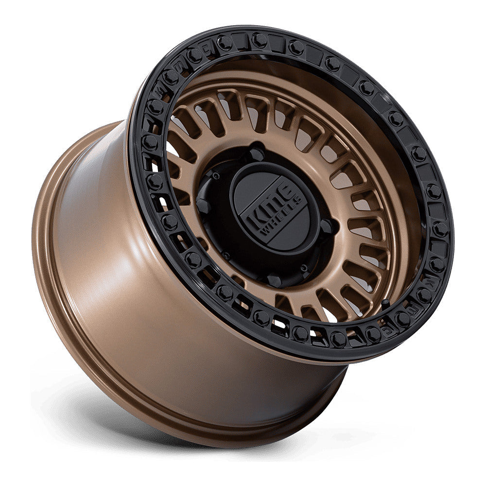 KMC Aztec Beadlock KS242 UTV wheel in matte bronze with matte black ring, side angle showing the barrel and lip