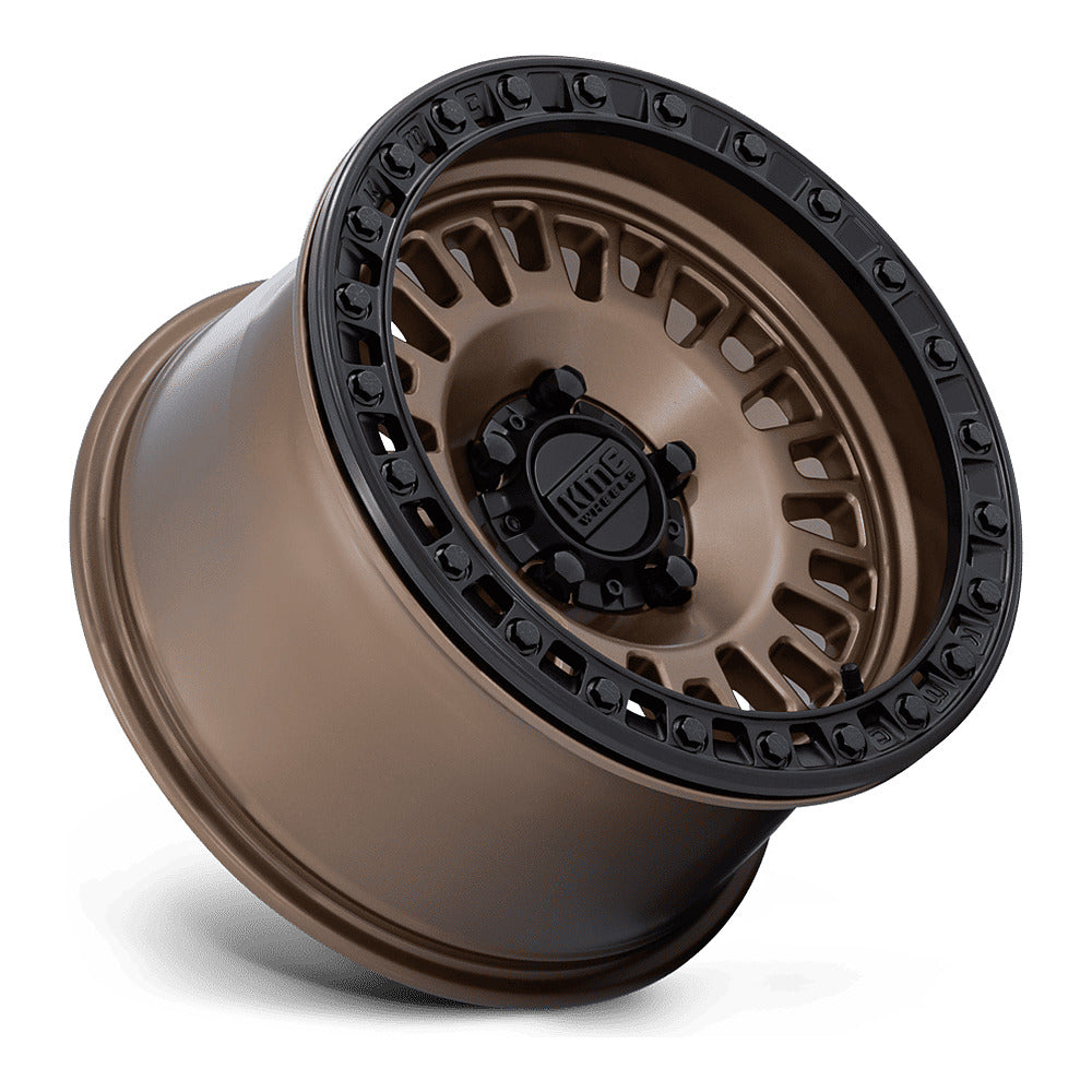 KMC Aztec Beadlock KS242 UTV wheel in matte bronze with matte black ring, side angle showing the barrel and lip