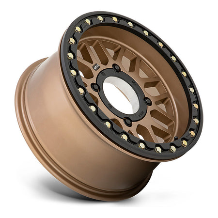 KMC Grenade Beadlock KS235 UTV wheel in satin bronze, side angle showing the barrel and lip