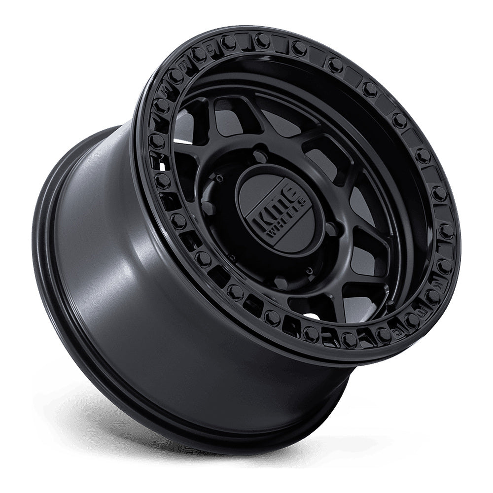 KMC Torx Beadlock KS241 UTV wheel in matte black with gloss black ring, side angle showing the barrel and lip
