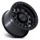Angled view of the KMC Wheels UTV / Side-by-side beadlock 15x8 matte black finish wheel, featuring a 6-element mesh design and zinc treated beadlock hardware, available in 4-lug, 5-lug, and 6-lug bolt patterns.