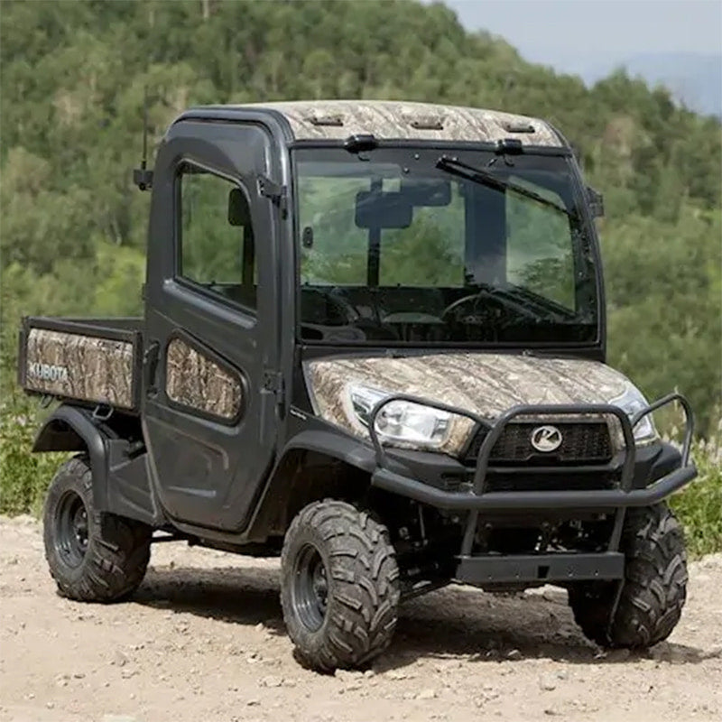 OTR 440 MAG heavy duty tires installed on camo body Kubota RTV and UTV, parked in the desert.