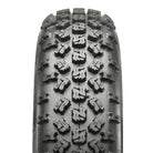 Close up detailed tread pattern view of the lightweight competition Maxxis RAZR Plus MX ATV / Quad front 4-ply bias tire, featuring a unique competition "s-lug" design for ultimate traction, offered with fast and free shipping, 20x6-10 size, Part # TM01033100.