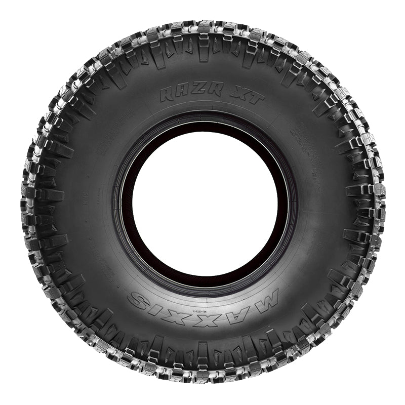 Sidewall view of Maxxis RAZR XT off road competition 8-ply steel belted radial UTV and SxS tire with extreme puncture resistance and increased sidewall stiffness with tread blocks that extend over the shoulder.