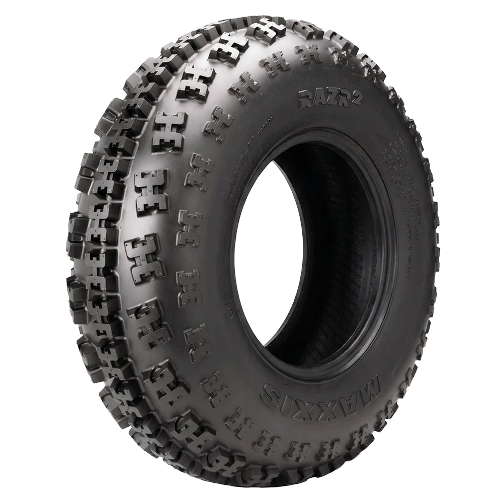 Angled view of the competition Maxxis RAZR2 ATV / Quad front tire, featuring a high traction "x" lug design with continuous center tread block base enhanced steering responsiveness, offered with fast and free shipping.