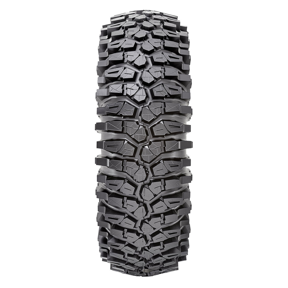 Detailed view of the aggressive rock crawling tread pattern and tread block lug design of the 8-ply standard and competition sticky Maxxis Roxxzilla UTV and SXS radial tire, featuring alternating staggered shoulder lugs for rock traction.