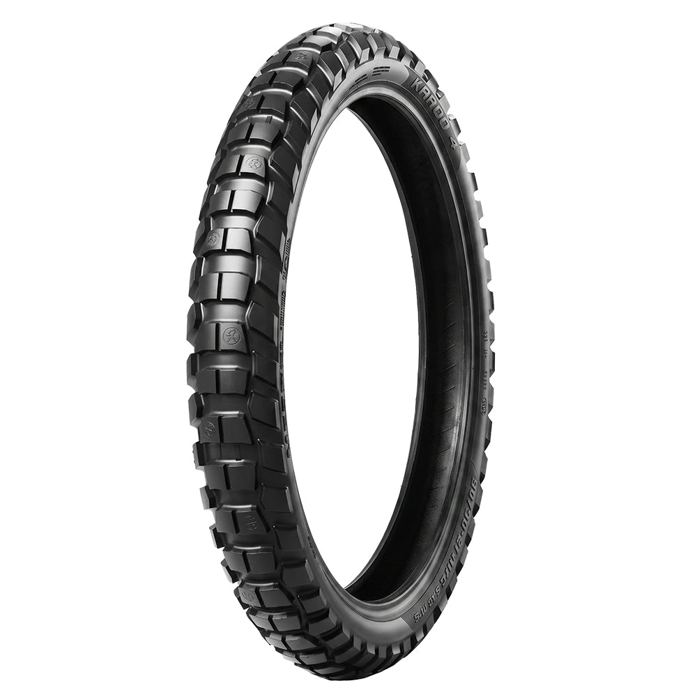 Angled view of the Metzeler Karoo 4 front motorcycle tire designed for ADV and Maxi Enduro riders to maximize performance and control, all sizes available with fast and free shipping.