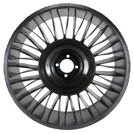 Full sidewall view of the #50357 Michelin X®Tweel in 24x12n12 size, 4x4 bolt pattern, designed for a large variety of zero turn ZTR mowers, garden tractors, and small UTVs, featuring poly-spoked design for improved hill handling and lateral stability.