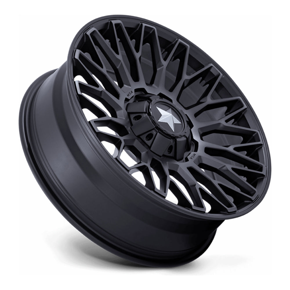 MSA Clubber M50 UTV wheel in matte black double dark tint, side angle showing the barrel and lip