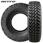 Main product image showing two different view of the Nitto Trail Grappler SXS steel belted radial lineup of UTV and SXS tires, made with premium long lasting and smooth riding segmented mold construction and high traction all-terrain lug pattern.