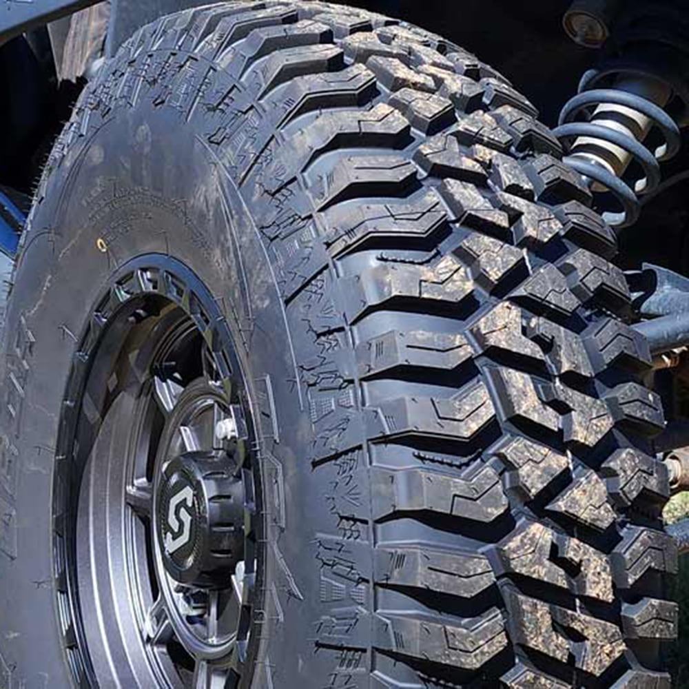 Up close detailed view of the tread pattern, lug design, and sidewalls of the new 32x10R15 and 35x10R15 Obor Tricera 8-ply Steel Belted Radial SBR Side-by-Side and UTV tire.