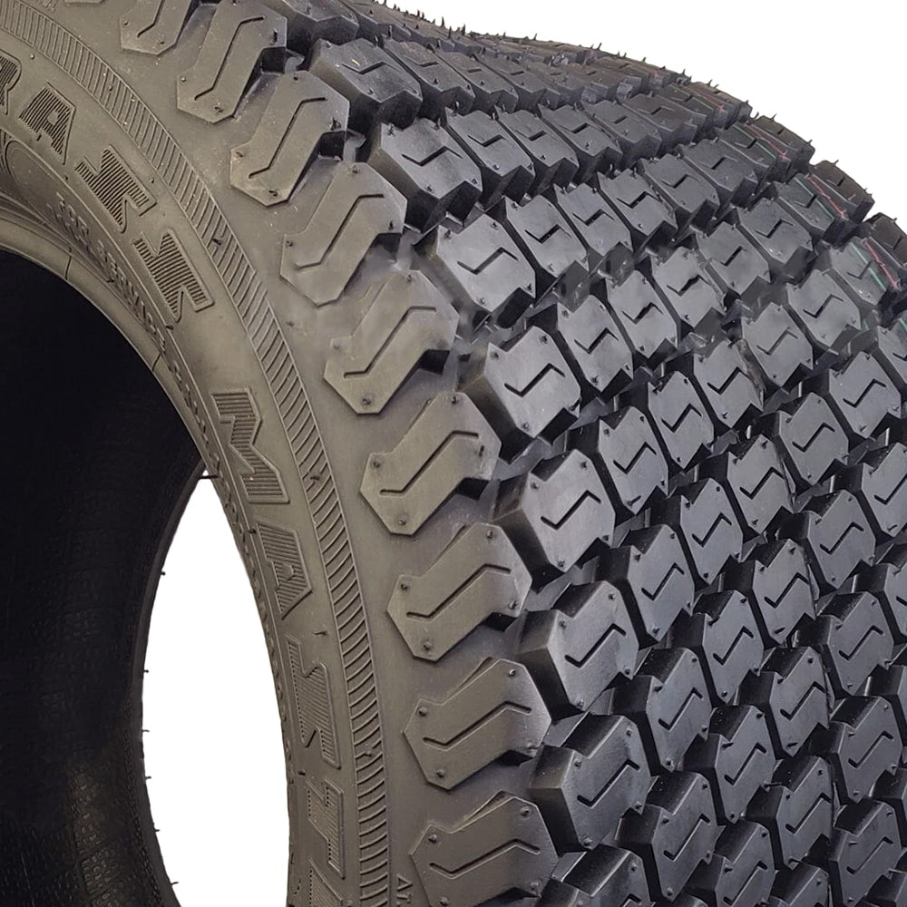 Close up and detailed tread pattern view of the OTR Grass Master lawn and turf bias tubeless tire designed for oem and aftermarket mower, ztr, and tractor applications.