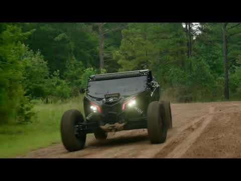 Youtube promotional video of the new Maxxis RAZR XTZ tire in 32x10R15 size, featuring a high traction all-terrain tread pattern with rugged 8-ply Nylon Radial construction and specialized rubber compound.
