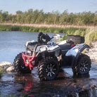 Polaris quad on the trail equipped with rugged and dependable Interco Radial Reptile ATV tires.
