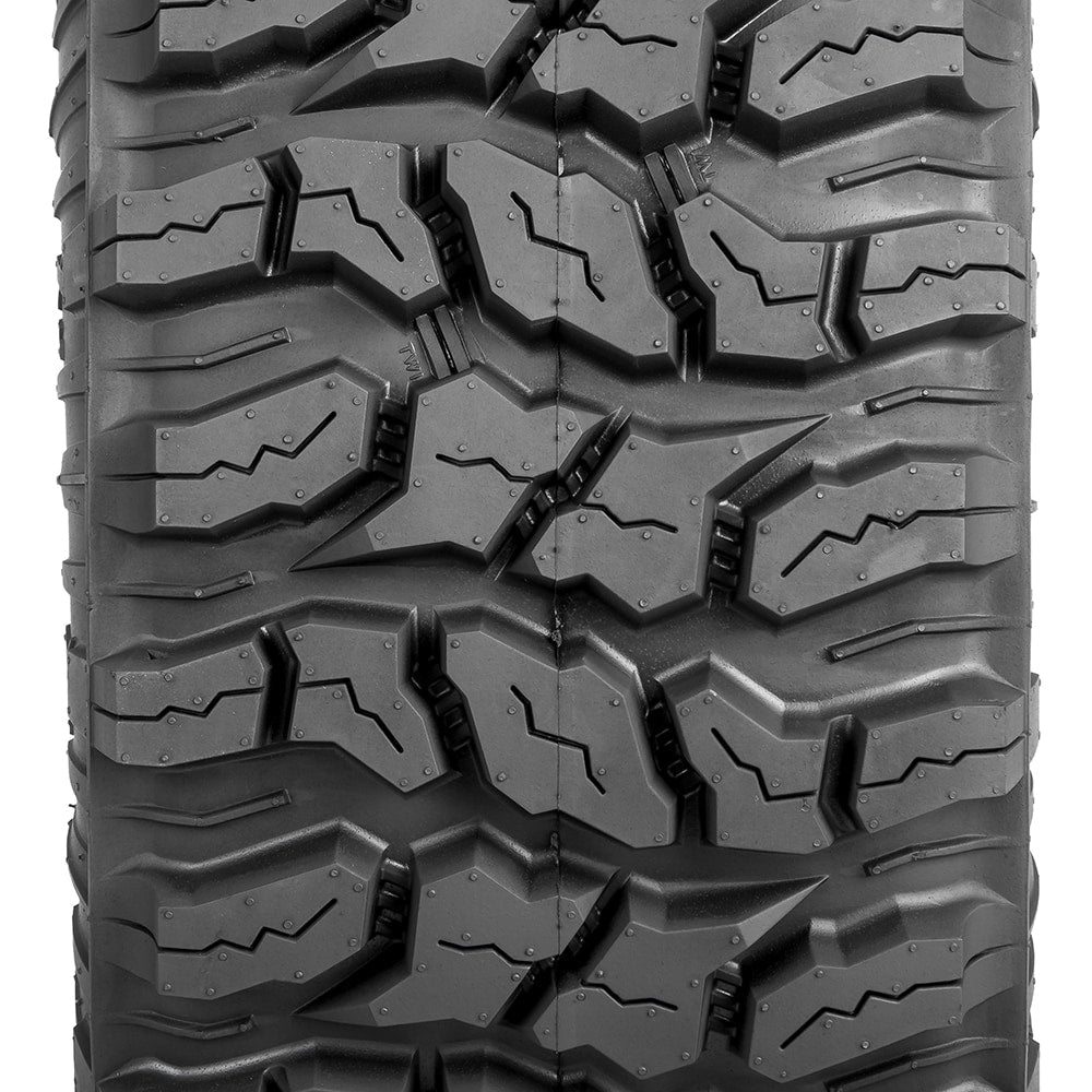Focused, highly detailed close up view of the tread pattern and lug block design found on the Sedona Coyote ATV tire, showcasing the multi-angled block design, functional and effective siping on all lugs, tread wear bars, and inter-lug casing stone ejectors, designed to ensure top performance for many miles.