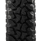 Close up detailed view of the tread pattern and lug block design of the new Sedona Ridge RIPR nylon radial 8-ply tire available in most sizes for 14" and 15" rims, showcasing the tread block siping, multi-angled lug design, and overlapping center tread blacks to ensure a smooth, quiet, and predictable ride and steering response.