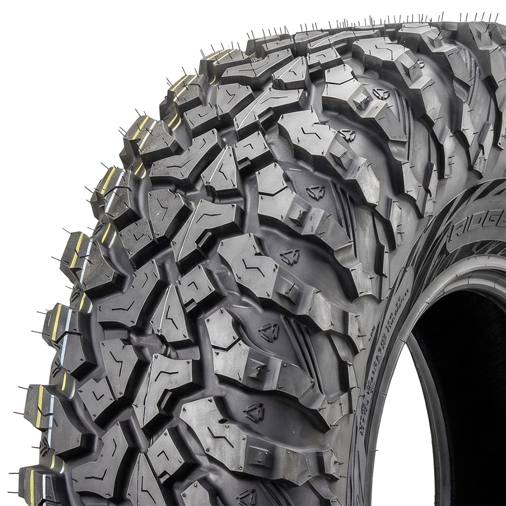 Close up detailed view of the tread pattern and multi-angled lug design of the new Sedona Ridge RIPR a/t UTV and SXS tire, featuring wider spaced, scalloped shoulder lugs, block siping, and attractive sidewall pattern, engineered to perform at a high level for trail riding and occasional road / pavement riding due to the specialized proprietary Sedona rubber compound.