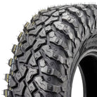Close up detailed view of the tread pattern and multi-angled lug design of the new Sedona Ridge RIPR a/t UTV and SXS tire, featuring wider spaced, scalloped shoulder lugs, block siping, and attractive sidewall pattern, engineered to perform at a high level for trail riding and occasional road / pavement riding due to the specialized proprietary Sedona rubber compound.