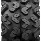 Close up tread pattern view of the Sedona Rip Saw R/T rear ATV and UTV tire, featuring opposed "v" tread blocks, strategic lug siping, and multi-angular block design.