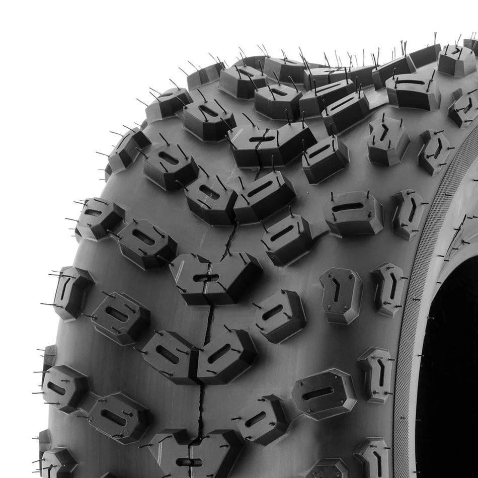 Close up view of the tread pattern and lug design of the SunF AOO5 4-wheeler, Quad, and 3-wheeler tire, with pocketed lugs and angled in-line tread blocks.
