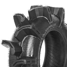 Close up, detailed view of the high quality construction and extra deep lug design of the Aztex XX UTV and ATV mud tire, designed with scoop style paddles, 20 per tire, designed with lightweight durable engineering technology and clamshell mold construction.