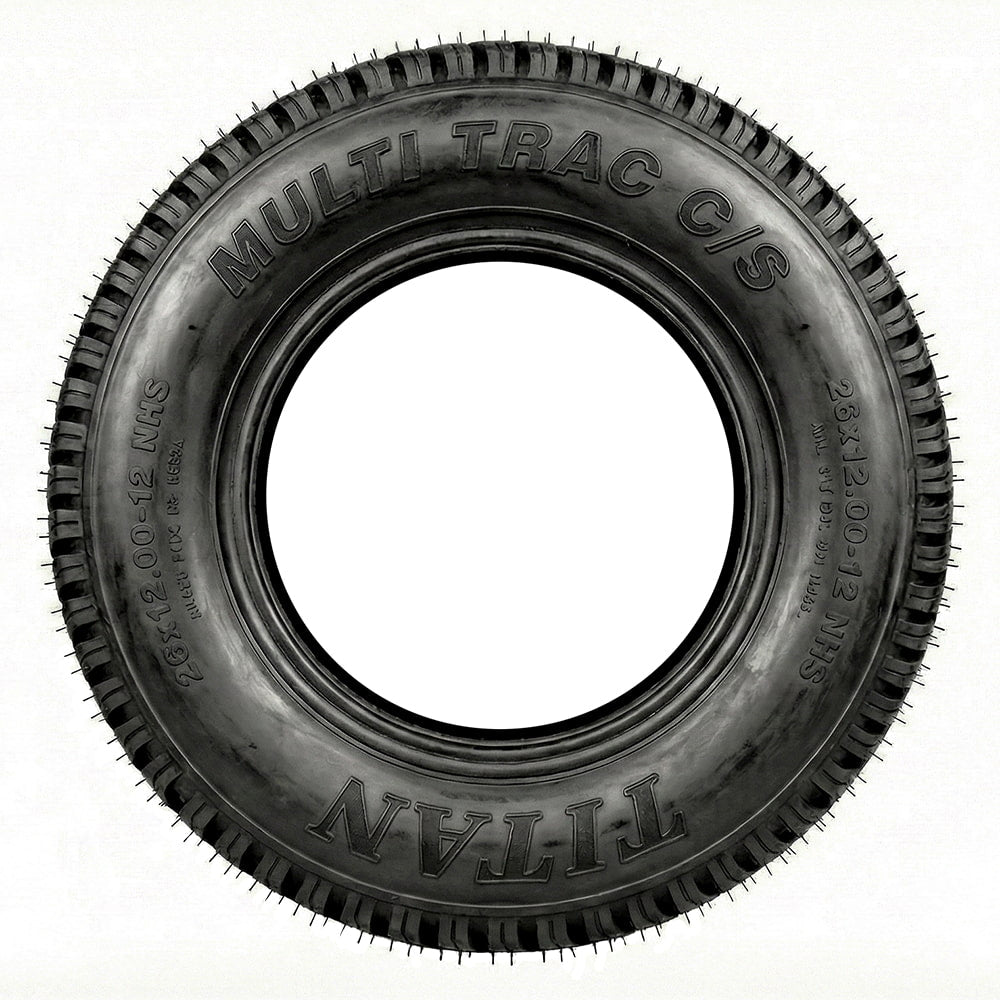 Full sidewall view of the Titan MultiTrac CS lawn and garden tire in 26x12.00-12 size, showing the Made in the USA stamping on the sidewall, as well as the robust wrap around shoulder lugs.
